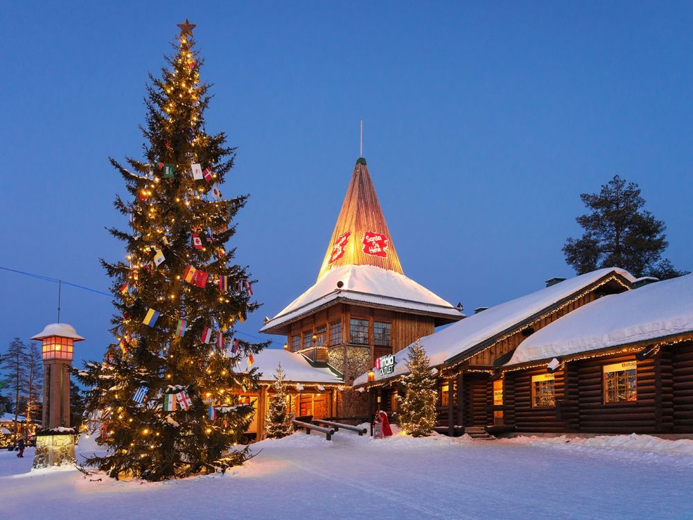 Santa Claus Village Lapland illuminated at night