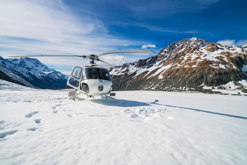 Helicopter Adventures on a New Zealand Snowy Mountain