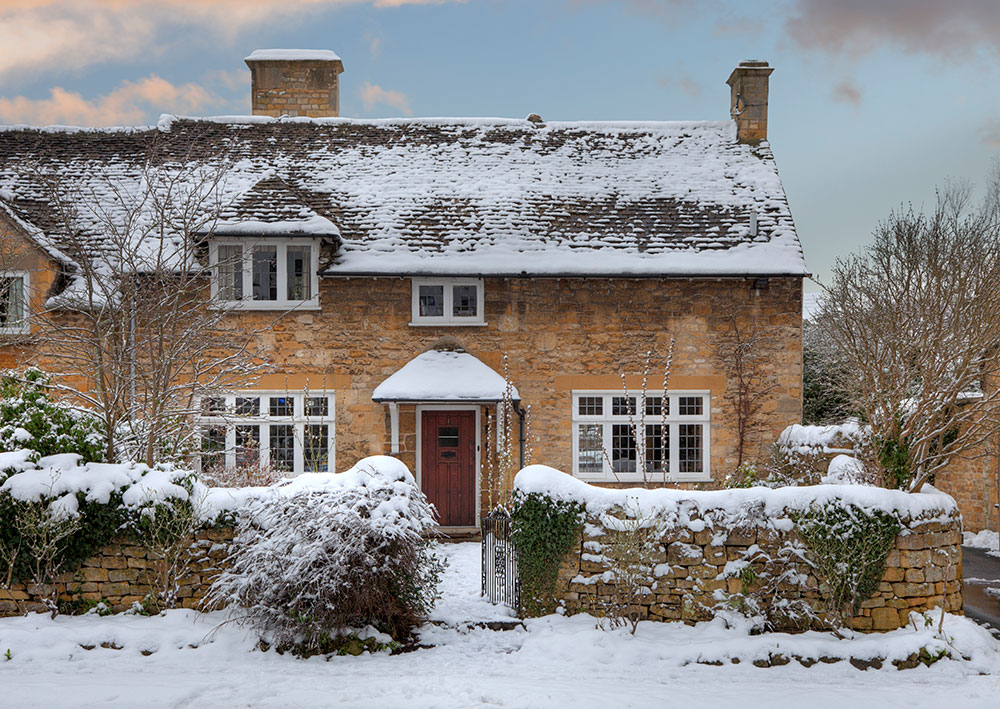 Cotswold cottage in snow