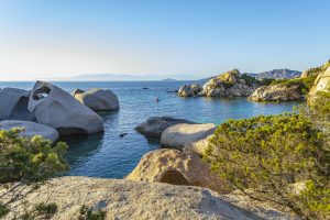 Sunset lights on the granitic rocks of Cala Scilla in Palau