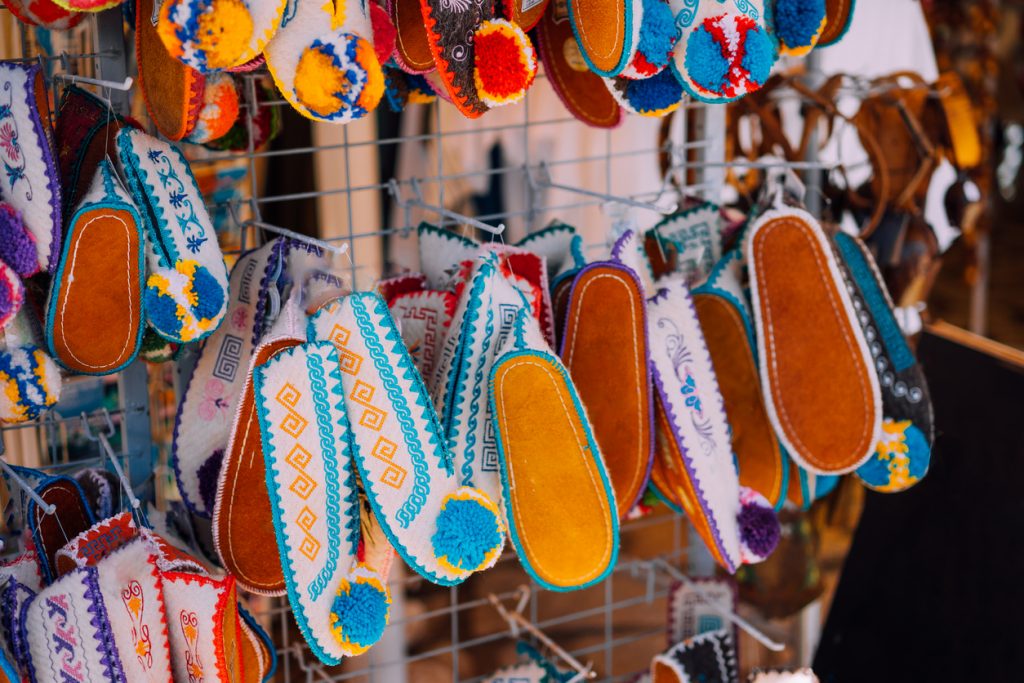 Souvenir shop. Traditional slipper Tsarouchi shoes