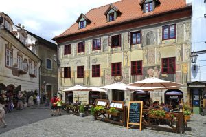 Restaurant and house with decorated facade in the Unesco World Heritage Cesky Krumlov