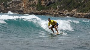 Surfing in Canyamel, Majorca, Spain
