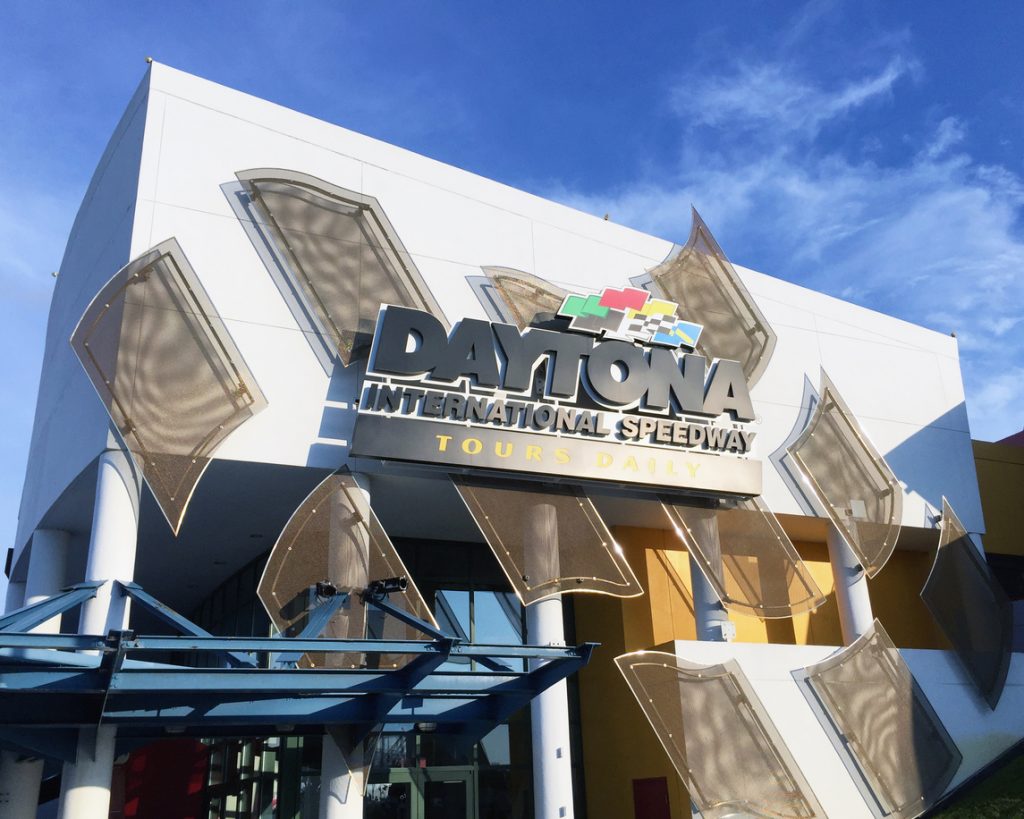 The sun is shining on the tour entrance to the Daytona International Speedway, one the world's most famous race venues.