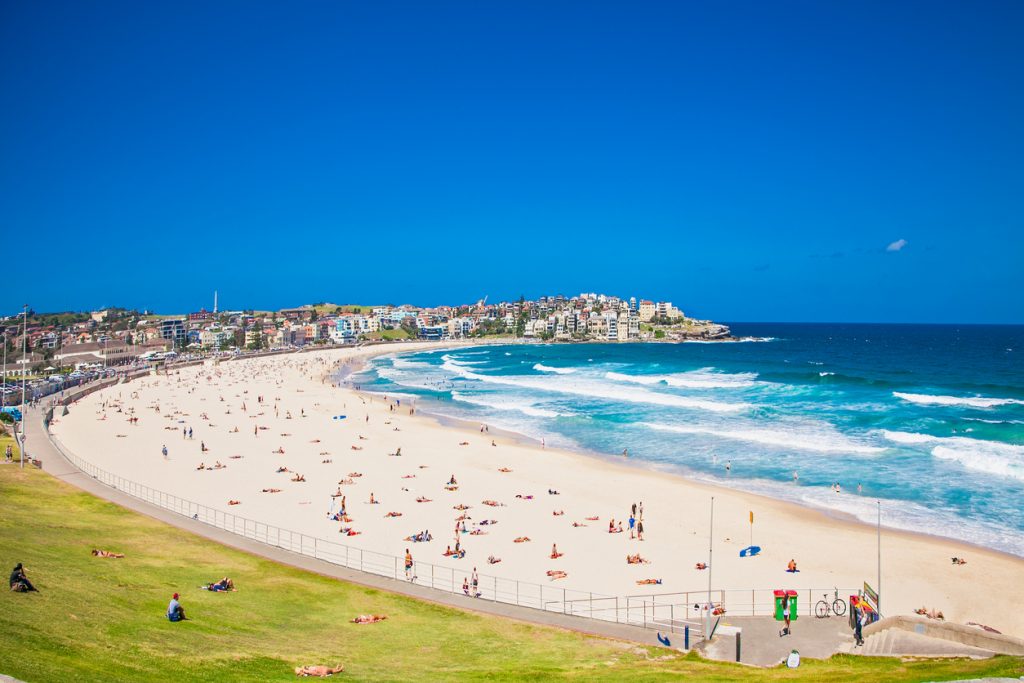 People relaxing on the Bondi beach in Sydney, Australia. Bondi beach is one of the most famous beach in the world.