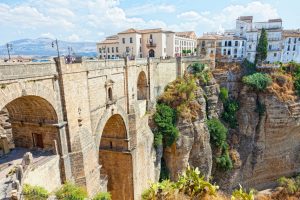 Bridge and houses on the edge of an abyss in the city Rhonda, Spain