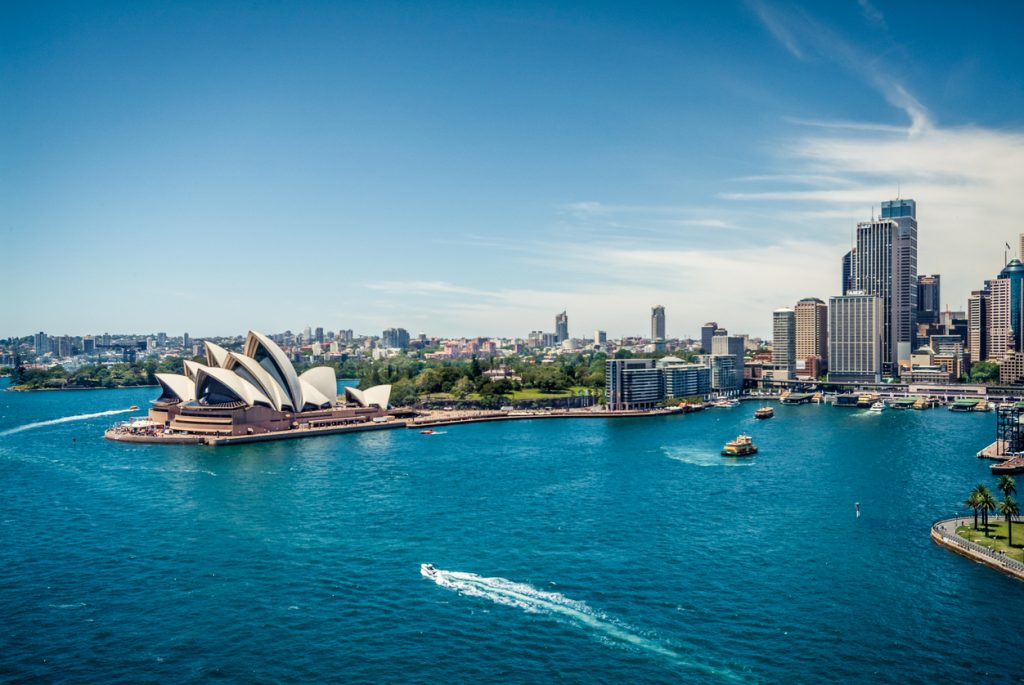 Sydney Opera House and Circular quay, ferry terminus, from the harbour bridge.