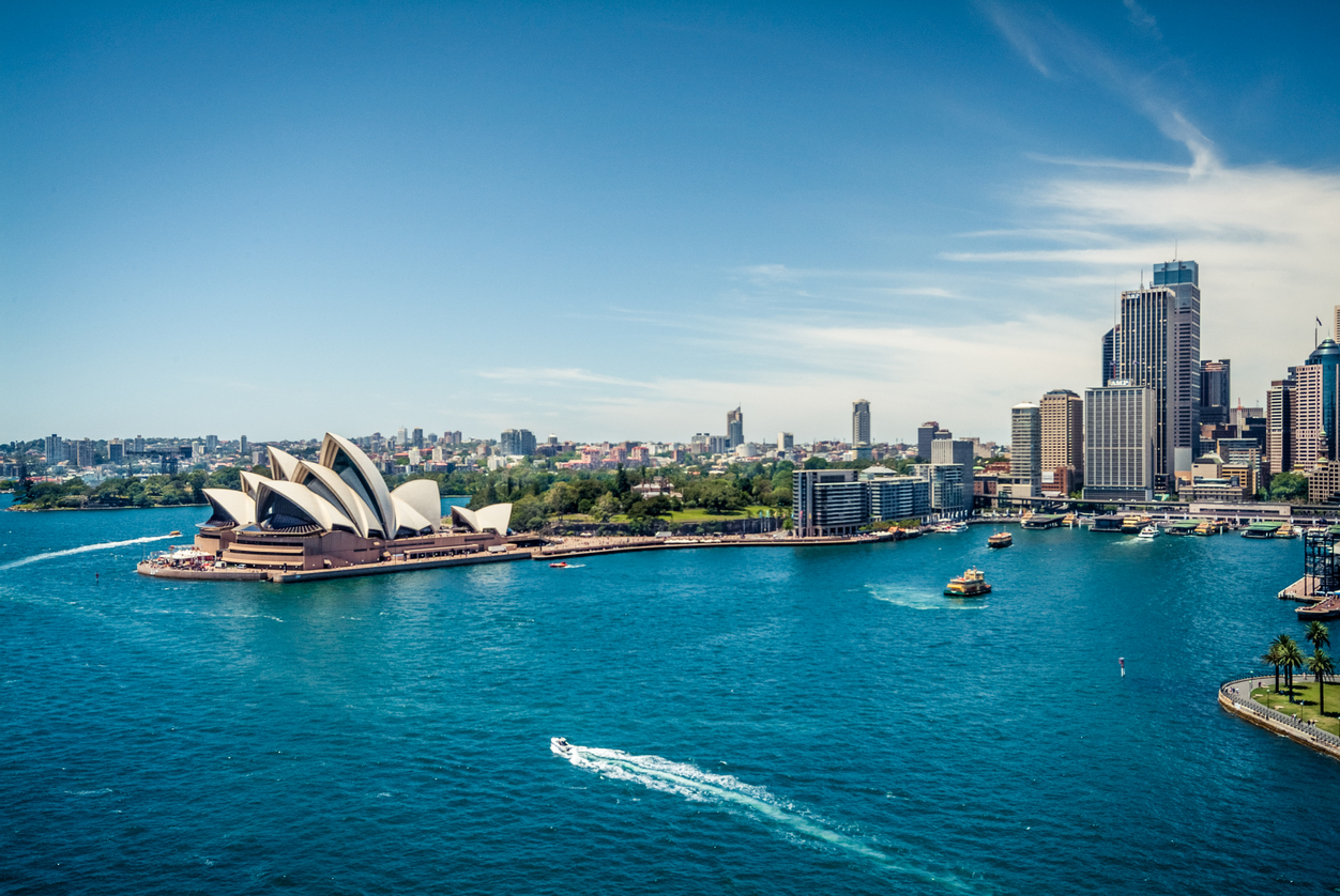 Sydney Opera House and Circular quay, ferry terminus, from the harbour bridge.