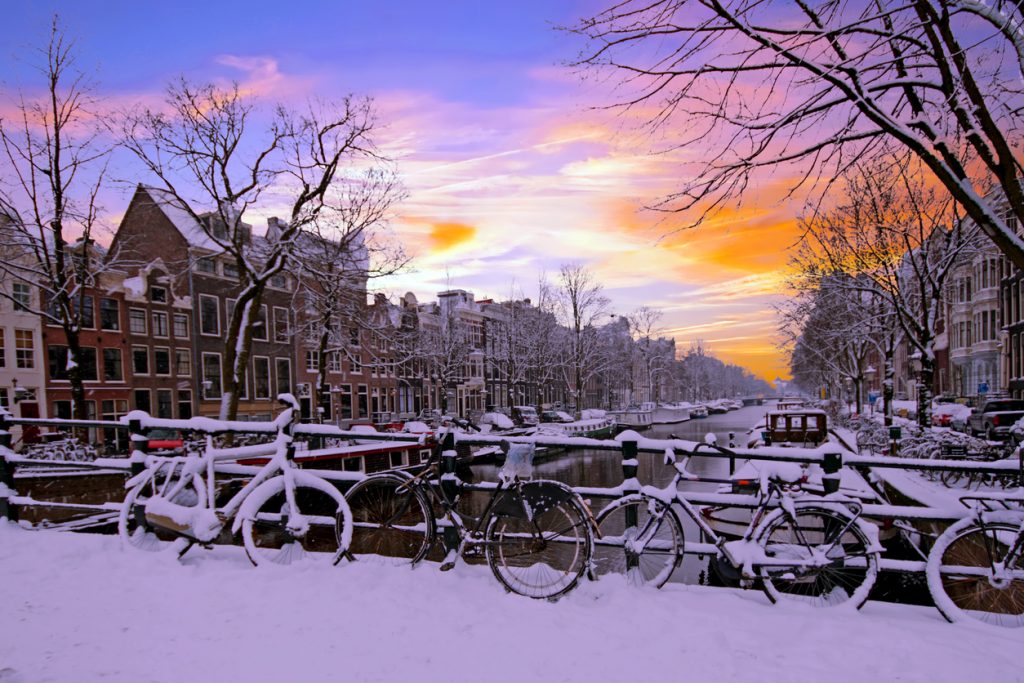 Amsterdam covered with snow in winter 