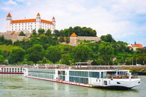 Cityscape of Bratislava with river cruise boat