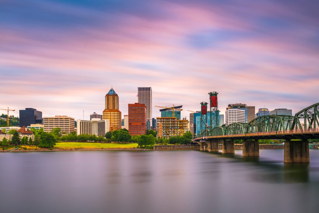 Portland, Oregon, skyline at dusk on the Willamette River.