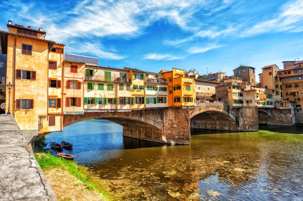 The Ponte Vecchio, or Old Bridge, is a medieval stone arched bridge over Arno river in Florence, Italy