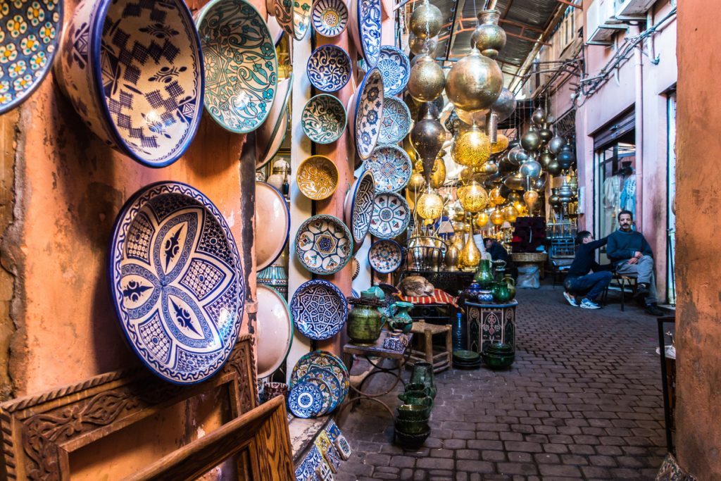 Typical shop with traditional Moroccan handicraft in the souk of Marrakech, Morocco 