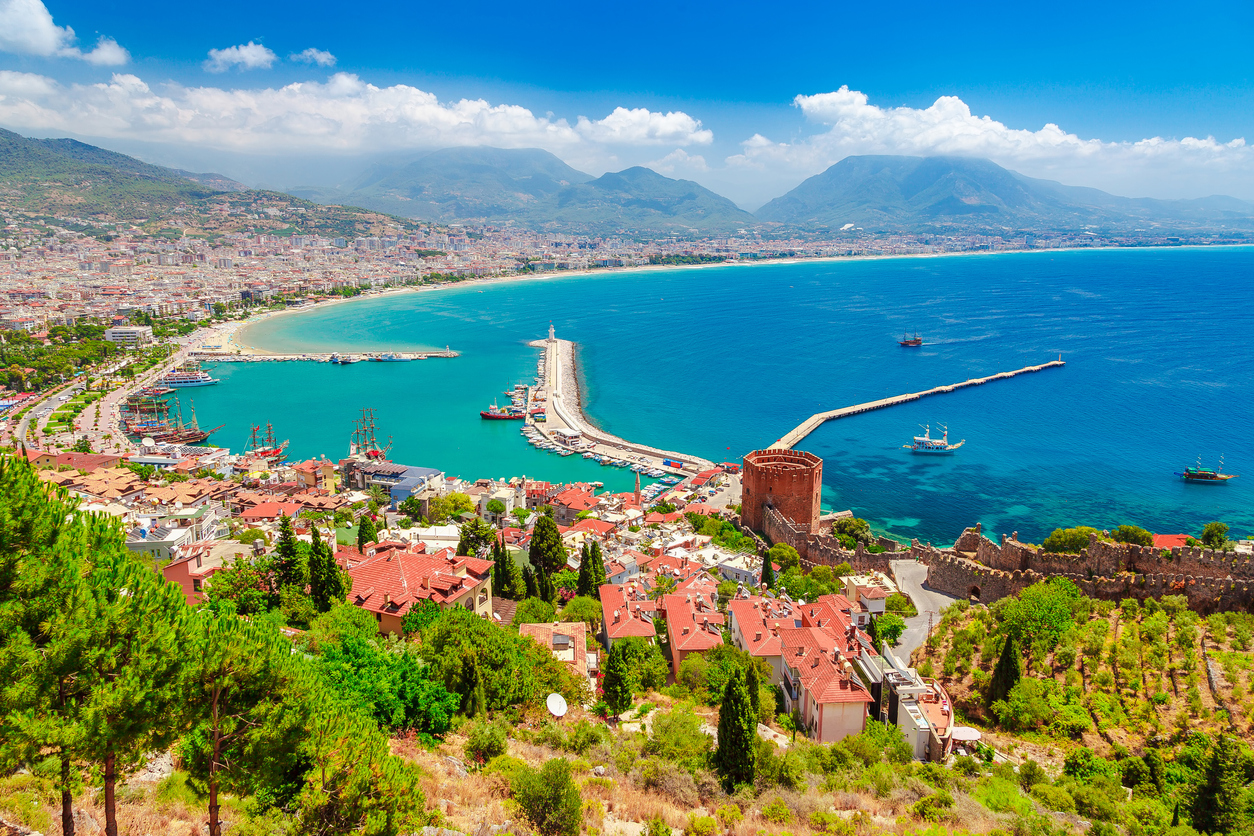 The landscape of Alanya with marina and Kizil Kule red tower in Antalya district, Turkey