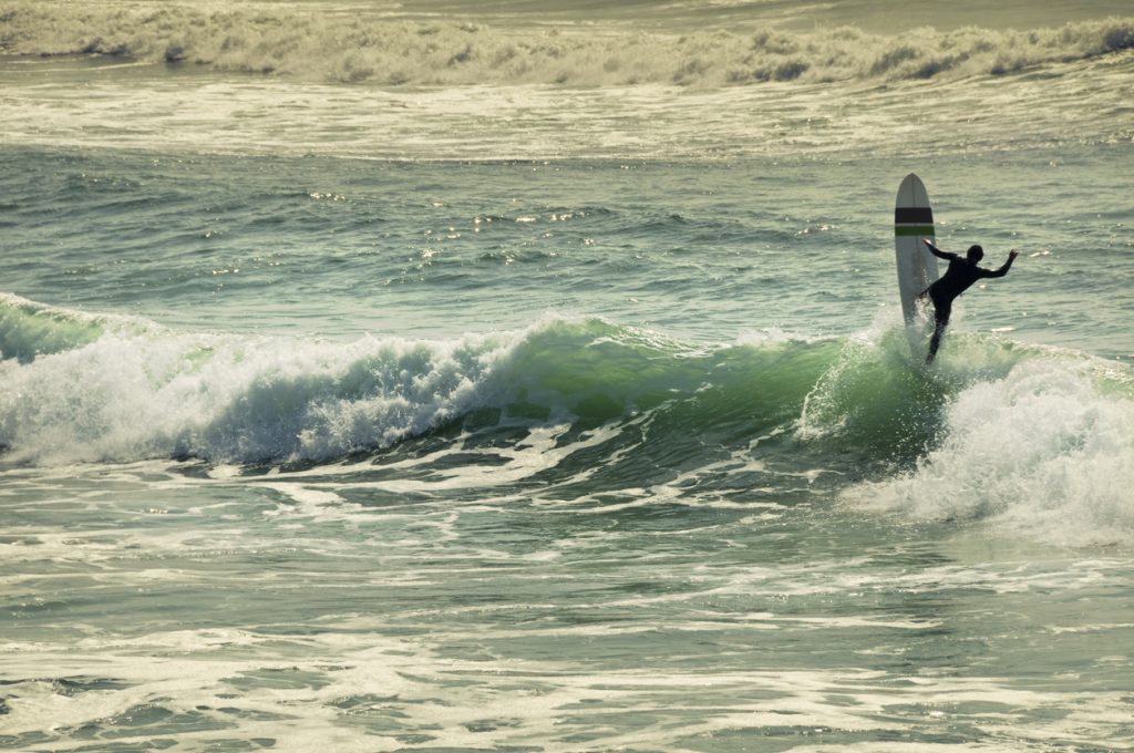 Longboard Surfer having fun in France