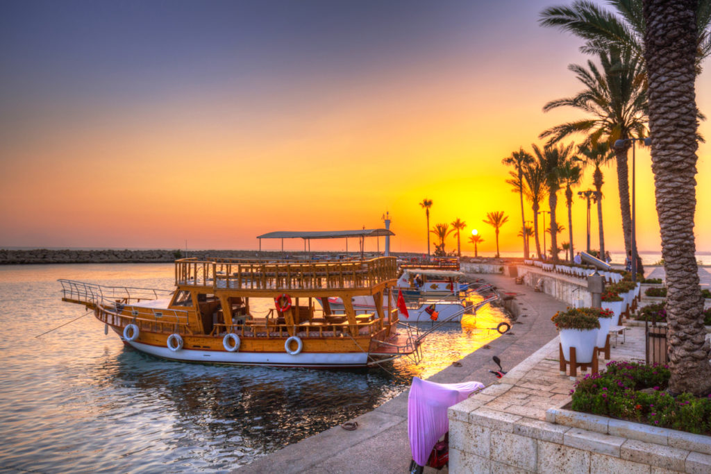 The harbour with boats in Side at sunset, Turkey