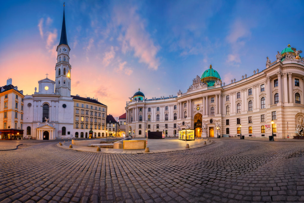 Cityscape image of Vienna, Austria with St. Michael's Square during sunrise.