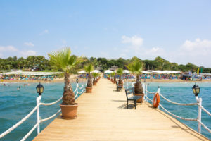 Wooden pier on the sea to beach in Turkey