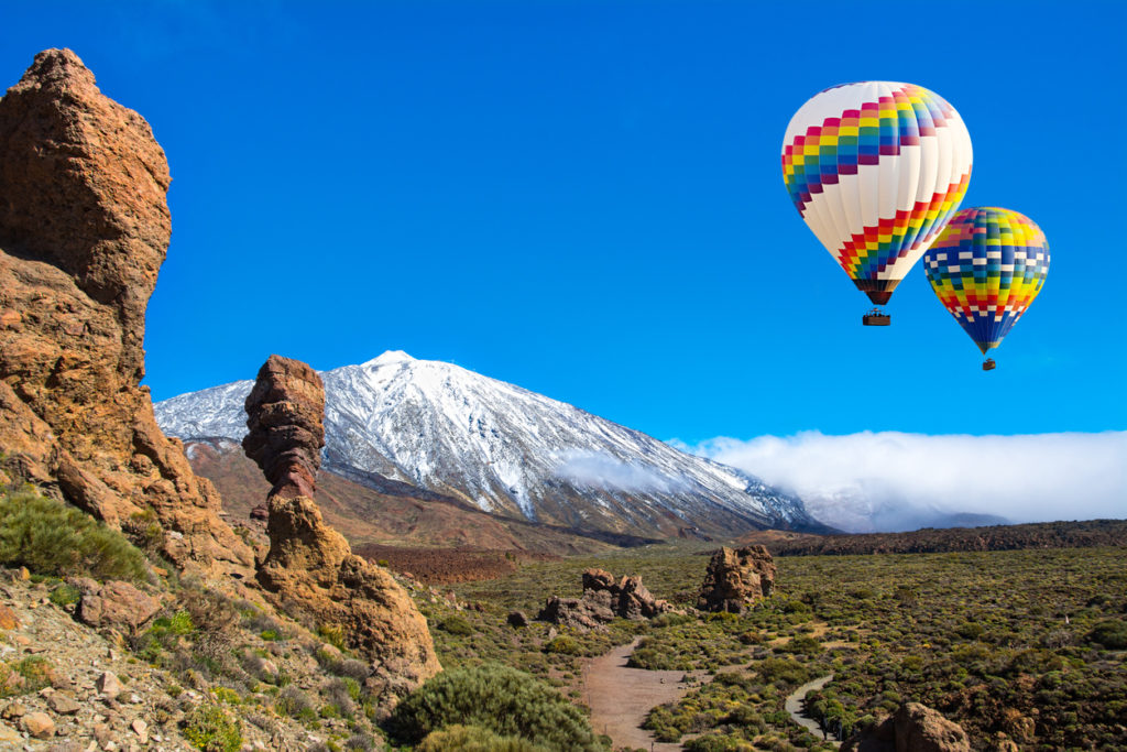  Beautiful view of unique Roque Cinchado unique rock formation with famous volcano Mount Teide