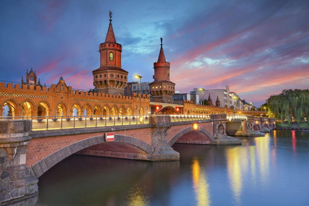 Image of Oberbaum Bridge in Berlin, during dramatic sunset.