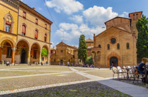 Piazza Santo Stefano, also called Piazza delle Sette Chiese, and the Basilica of Santo Stefano in Romanesque and Italian Gothic style.