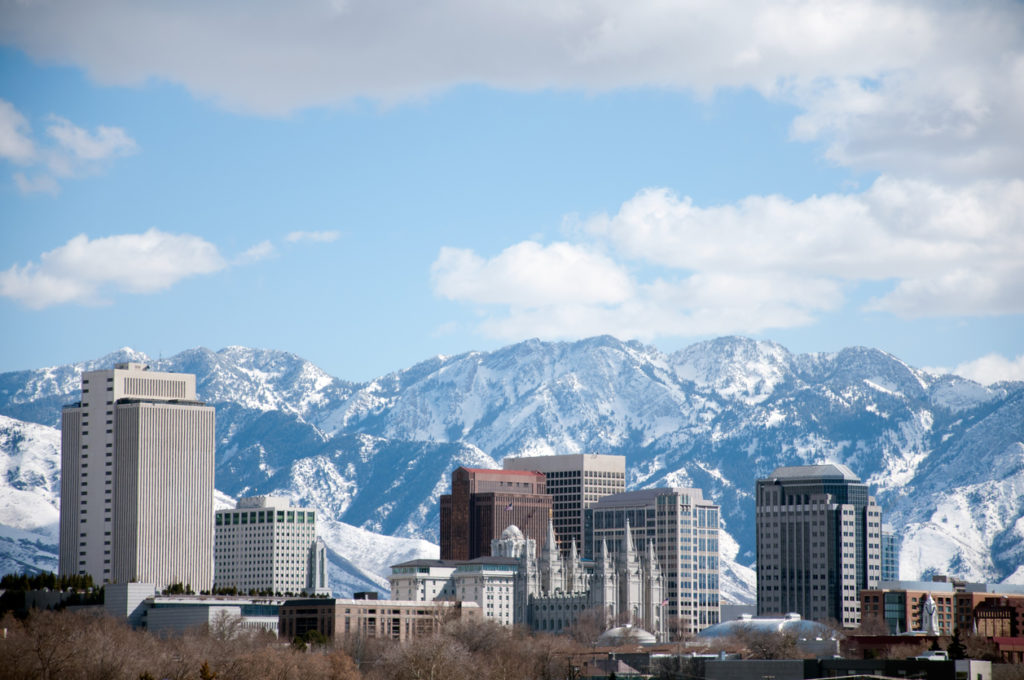 Salt Lake City Utah Winter Skyline With Snow Covered Mountains 