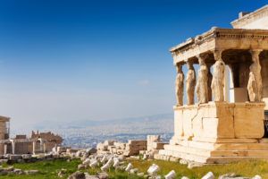 Beautiful view of Erechtheion with the panorama of Acropolis in summer in Athens, Greece