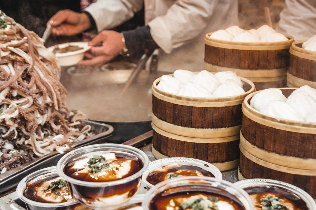 Local specialities at a street food market - Beijing, China