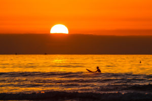 Londboard Surfer at Sunset at La Jolla