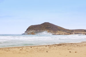 Windsurfing on the bay at Playa de los Genoveses, San Jose, Almeria Province, Spain