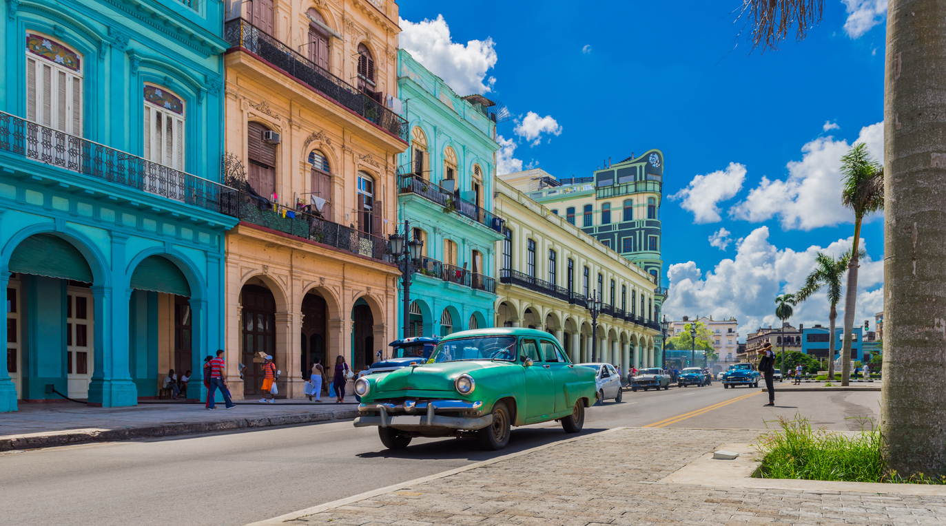 American green vintage car on the main street in Havana City, Cuba