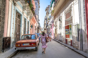 Walking through an old street of Havana in Cuba