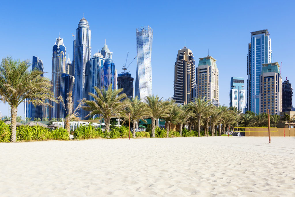 Horizontal view of skyscrapers and jumeirah beach in Dubai. UAE