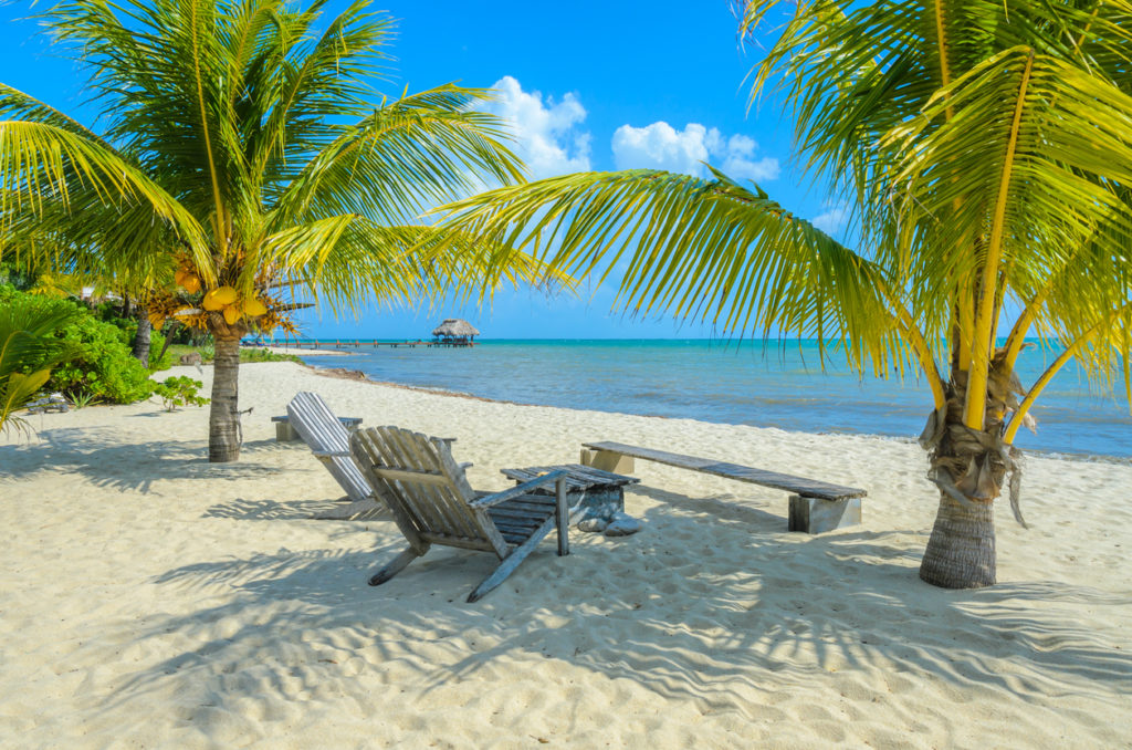 Paradise beach in Placencia, tropical coast of Belize, Caribbean Sea, Central America.