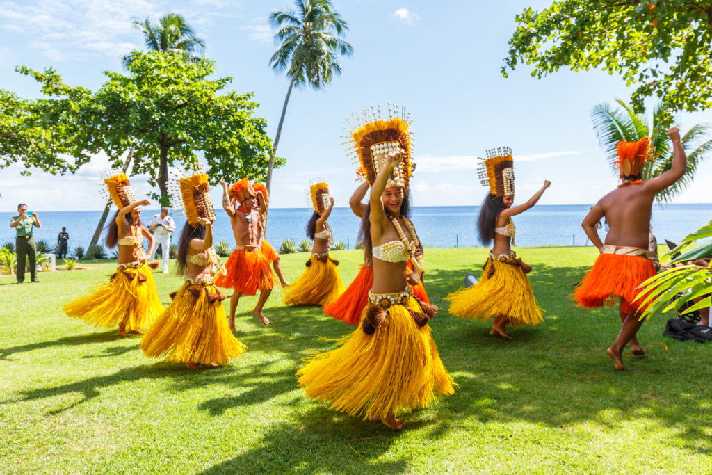 Polynesian women perform traditional dance in Tahiti Papeete, French Polynesia. Polynesian dances are major tourist attraction of luxury resorts of French Polynesia