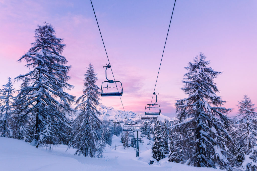 Winter mountains panorama with ski slopes and ski lifts near Vogel ski center, Slovenia