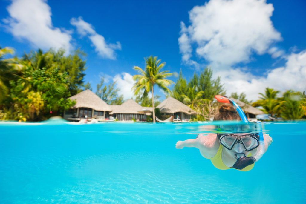 Woman snorkeling in Tahiti