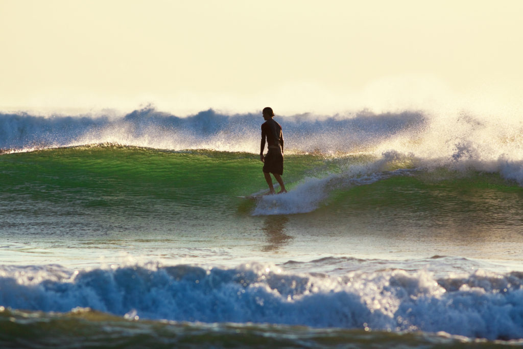 Surfing in Sunset in the Dominican Republic