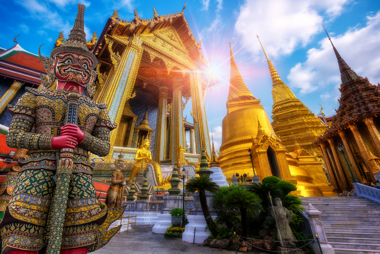 Travel concept, Giant statue at Temple Wat Pra Kaew, Grand Palace, Bangkok Thailand