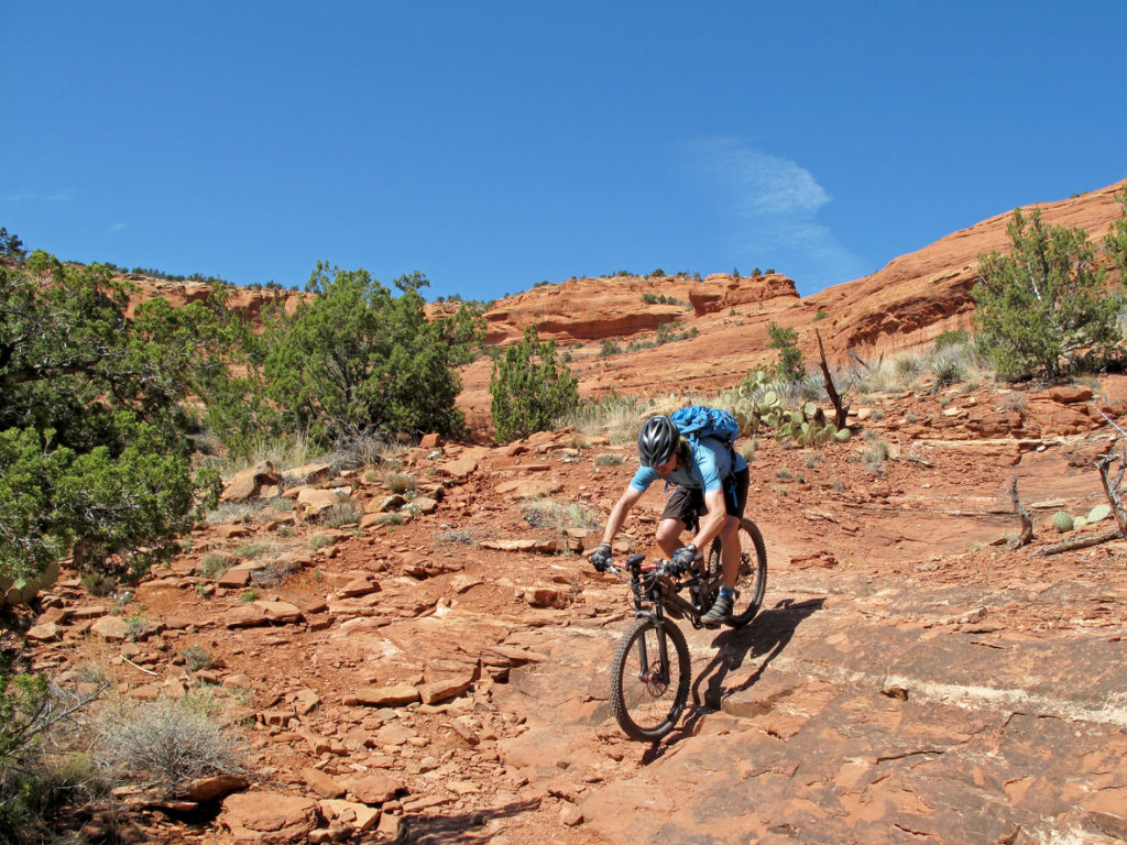 Mountain biker in the red rocks, Sedona, Arizona, USA