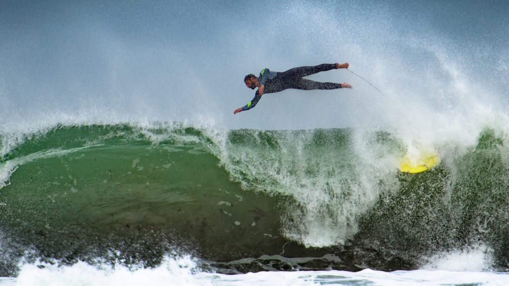 Surfing the powerful waves in Peniche, Portugal