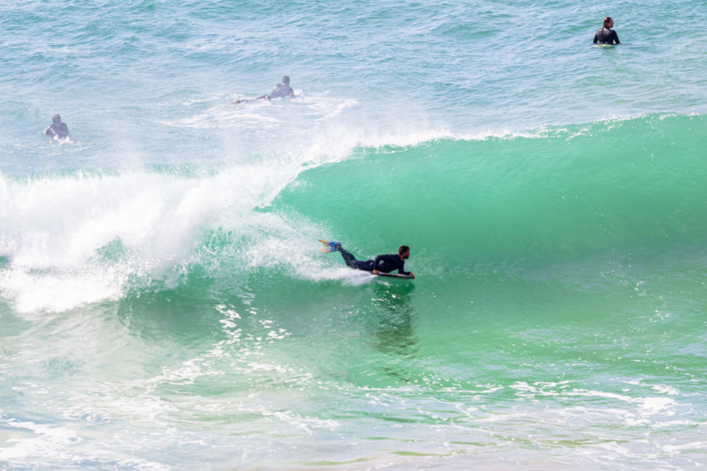 Surfers at Beliche Beach