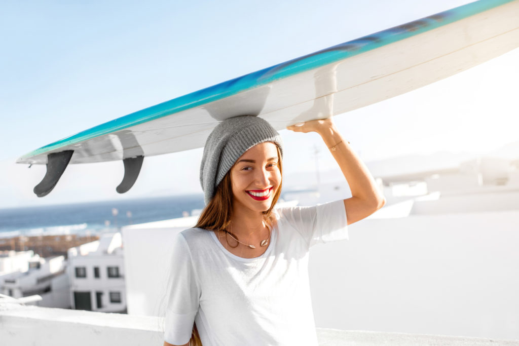 Surfer off to the beach in Lanzarote