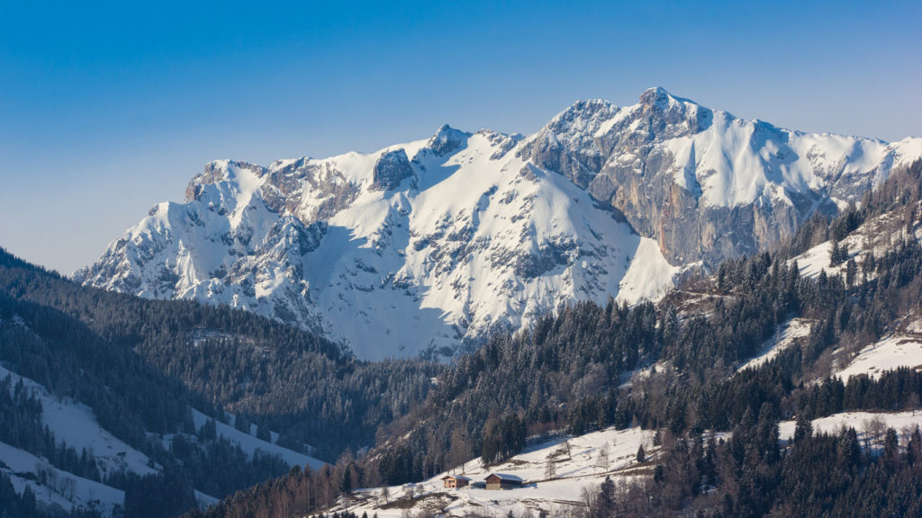 Sunset beautifully illuminates the Austrian Alps near St. Johann