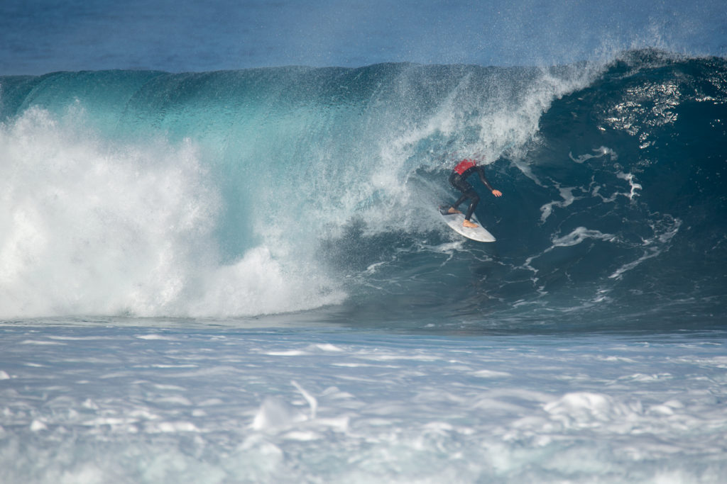 surfer in action on a big wave