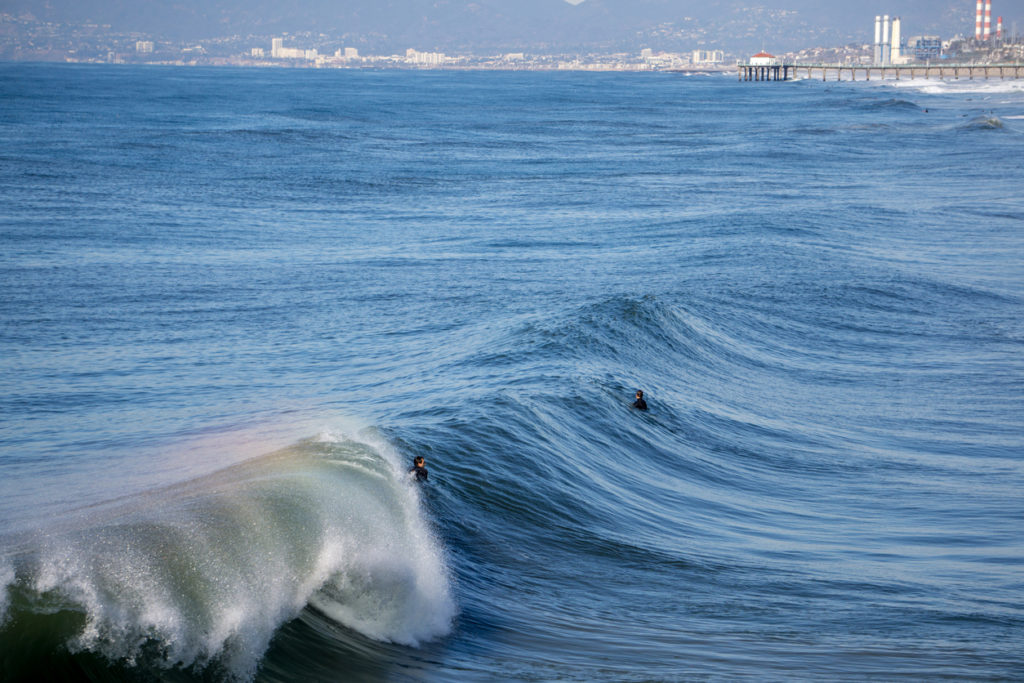 Surfers in Hermosa Beach, California