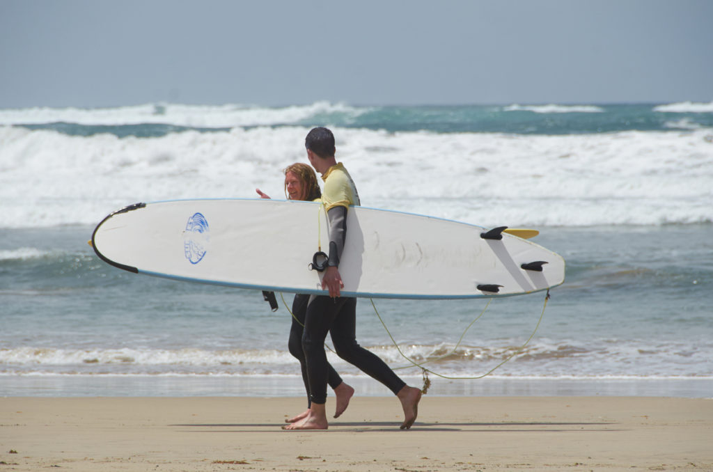 Two surfers walking in Lanzarote