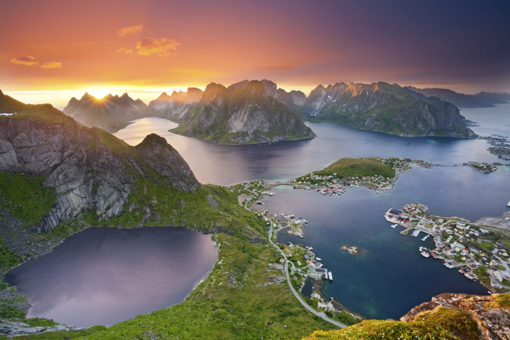 View from Reinebringen at Lofoten Islands, located in Norway, during summer sunset.