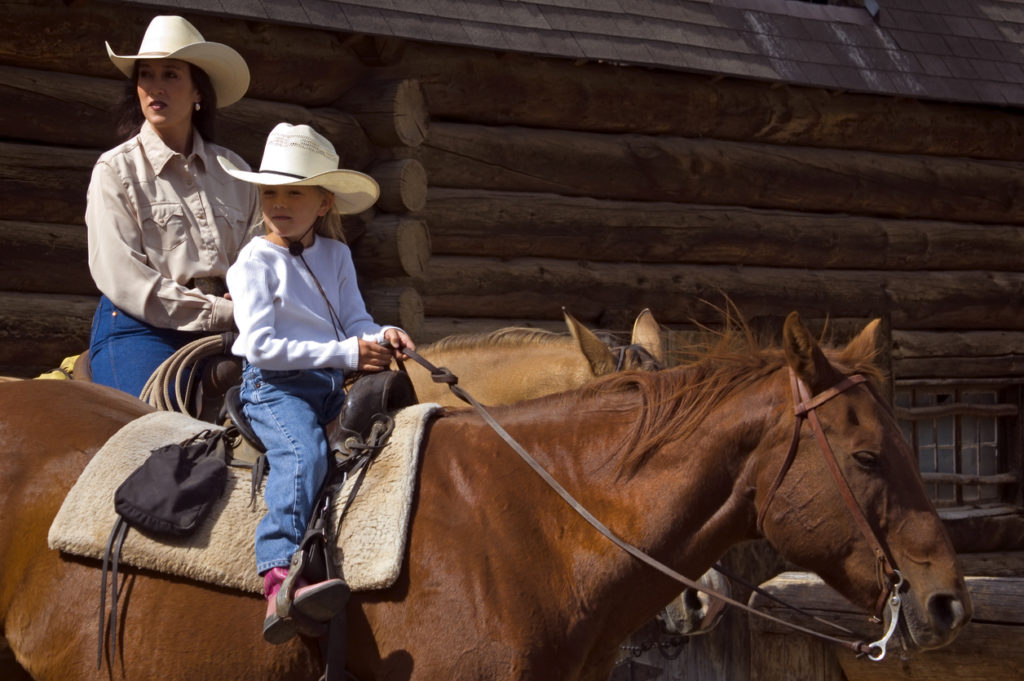 Horseback Mother and Daughter in Montana