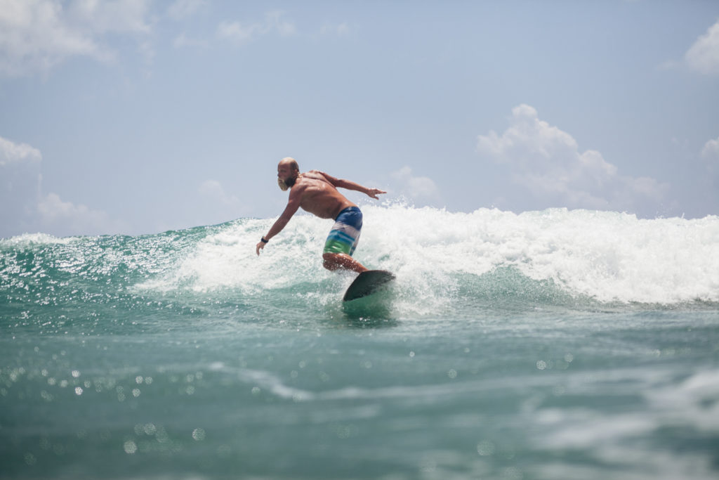 Surfing in Board Shorts in Fuerteventura